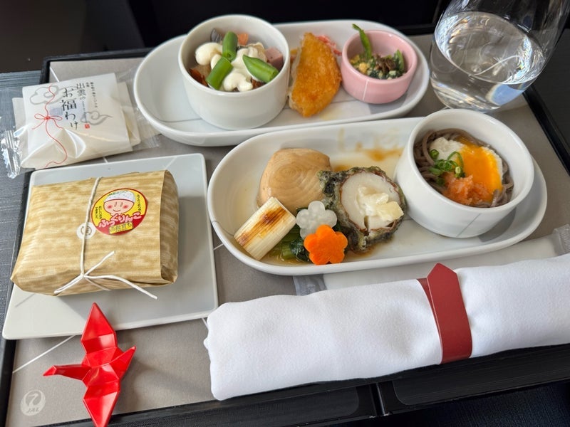 薬丸裕英 機内食でさめの煮付けの画像
