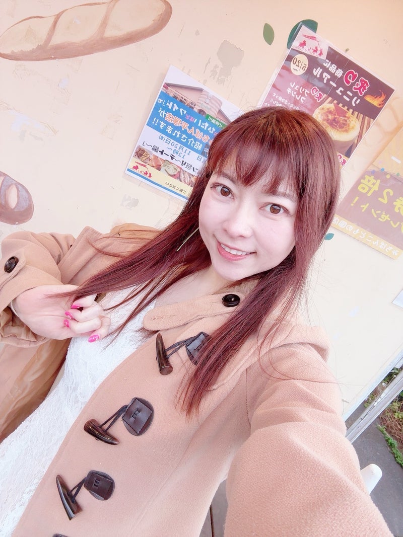 右手で持ったと思われる母からの電話の画像