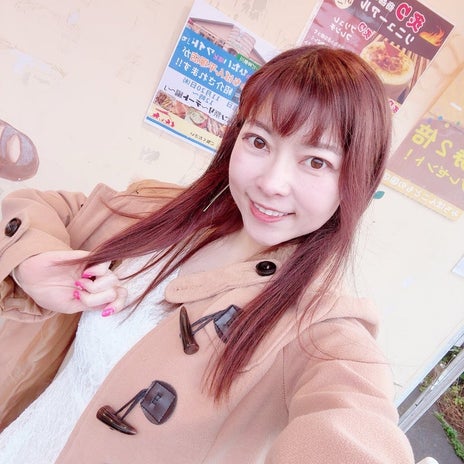 右手で持ったと思われる母からの電話の画像