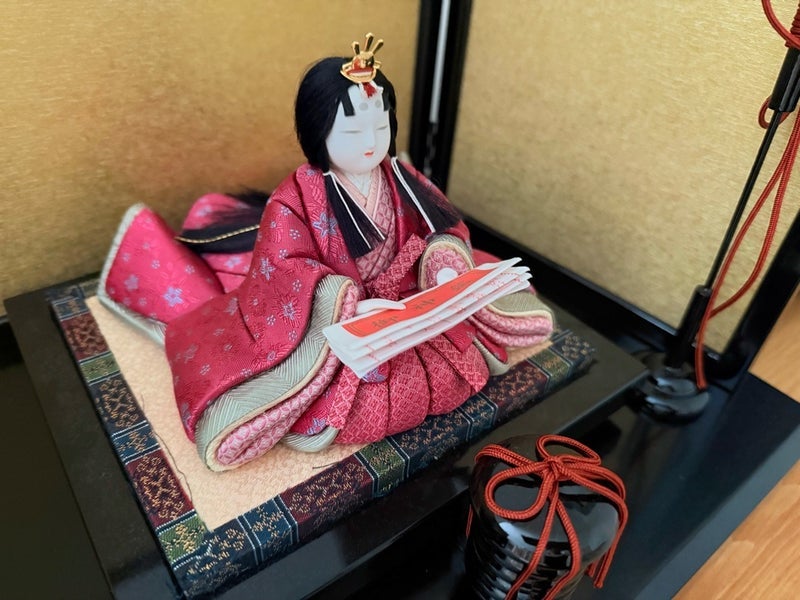 お雛様にあげた自分の大吉おみくじの画像