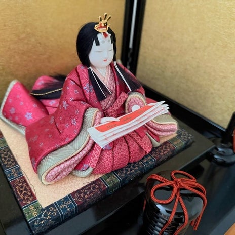 お雛様にあげた自分の大吉おみくじの画像