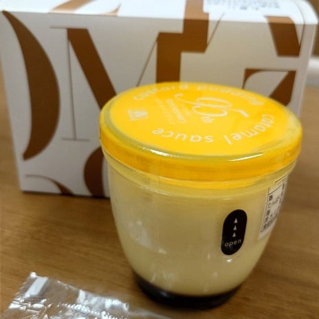 胎盤とツーショットを撮った旦那の画像