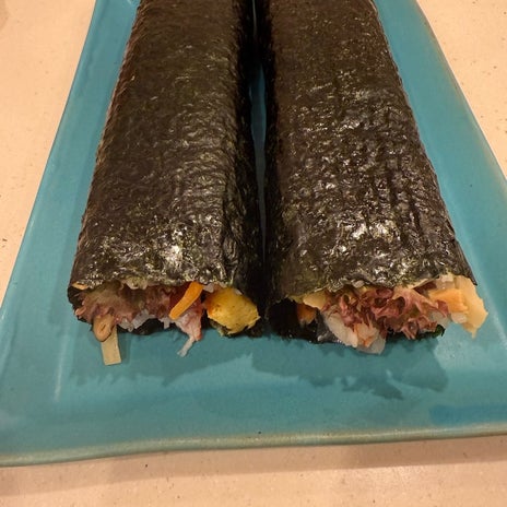 小川菜摘 無言で一本丸かじりの画像