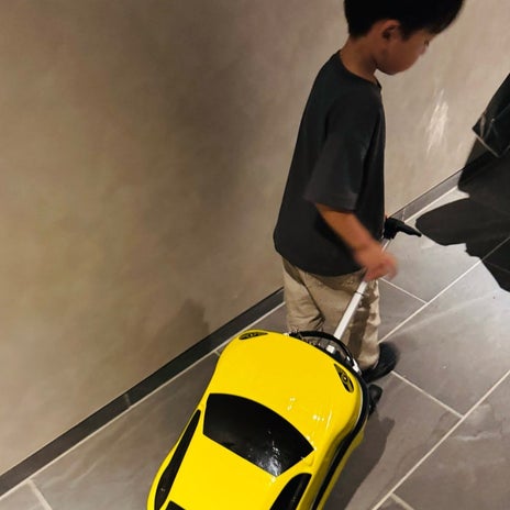 だいた 荷物を運ぶ息子の成長の画像