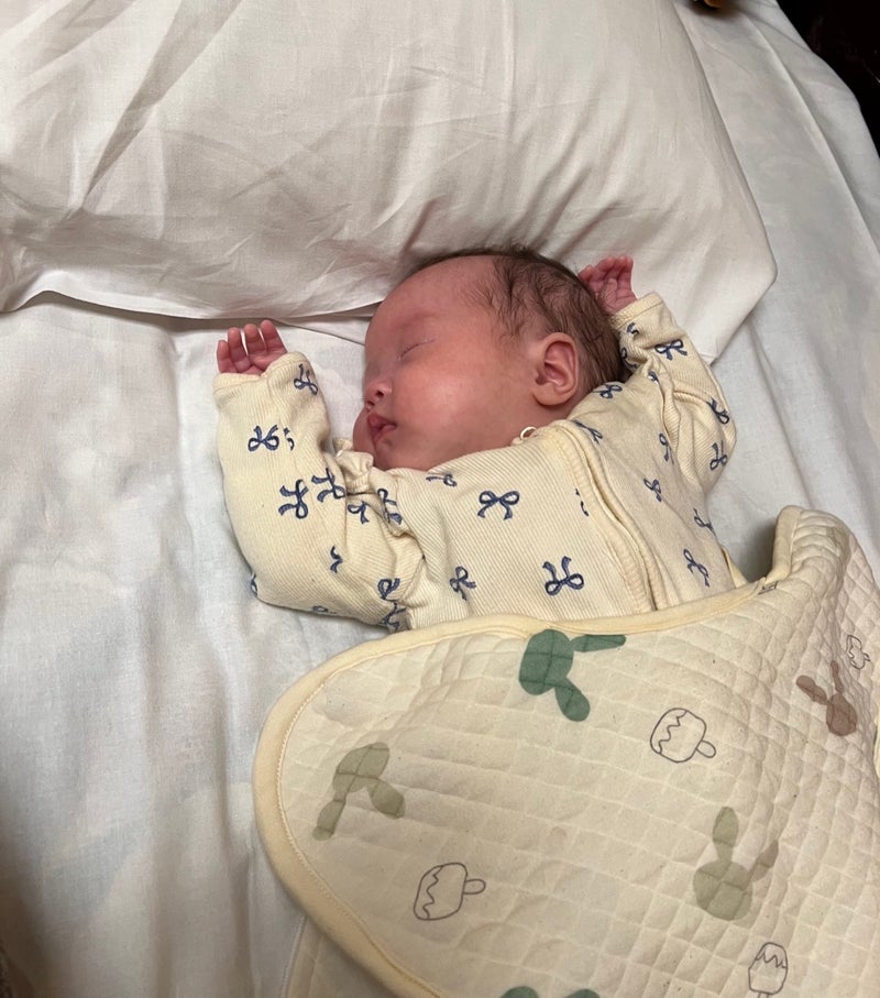 寝不足で迎えたお宮参りの写真の画像